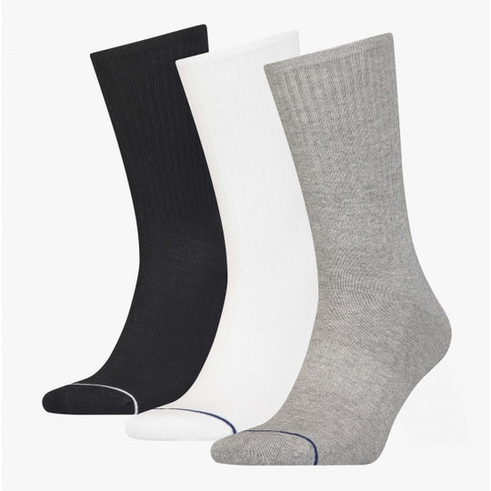 Calvin Klein 3 Pack Mens Crew Trainer Socks Grey, side view showcasing grey, black, and white socks, ribbed design.
