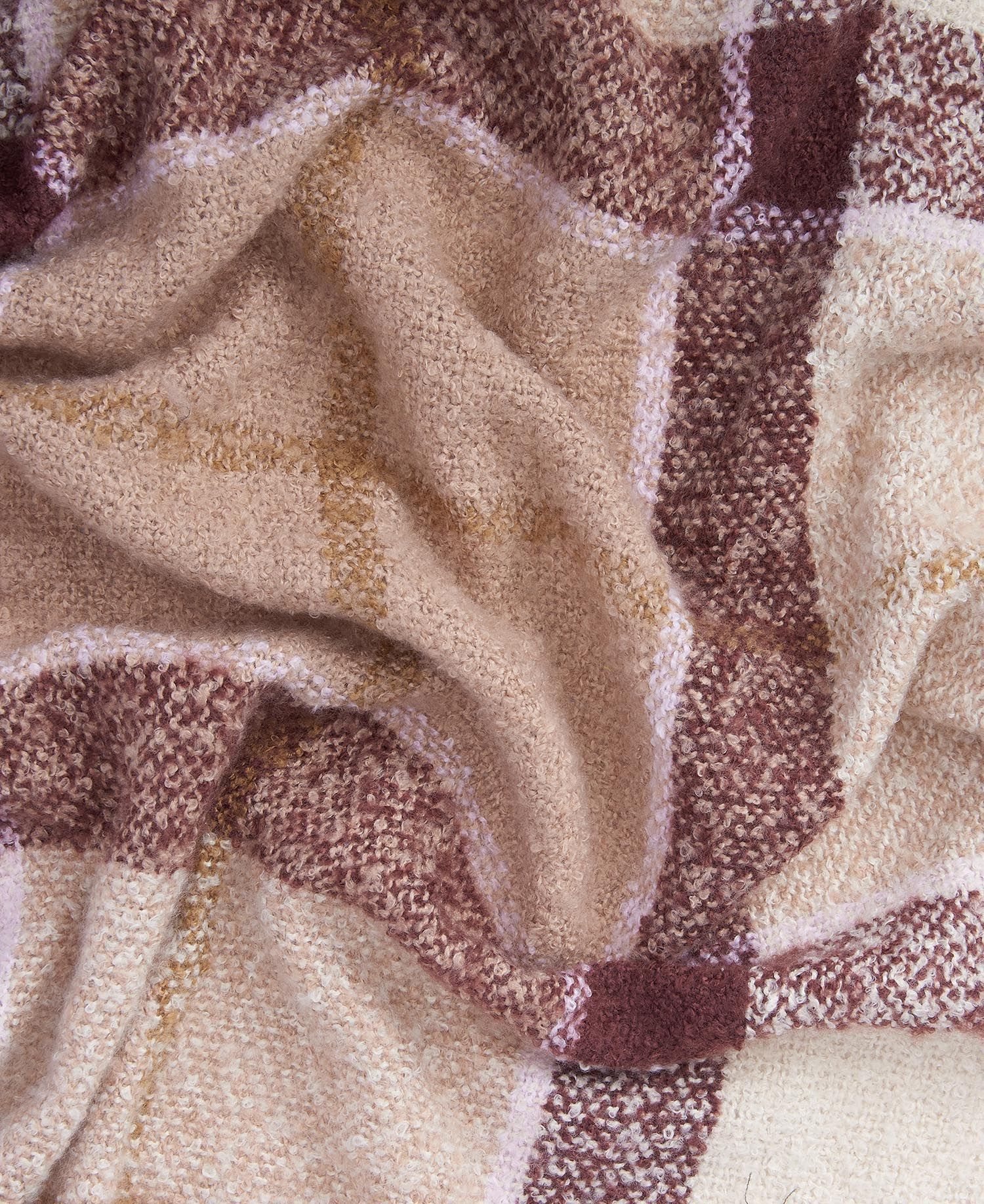 Barbour TARTAN BOUCLE Scarf Womens Muted Cabernet close-up view of textured fabric and pattern detail.
