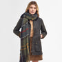 Barbour TARTAN BOUCLE Scarf Womens Classic worn by model, front view, showcasing textured design and tasselled hem.