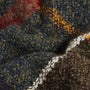 Barbour TARTAN BOUCLE Scarf Womens Classic detail view of textured boucle yarn in dark green, navy, orange, and brown.