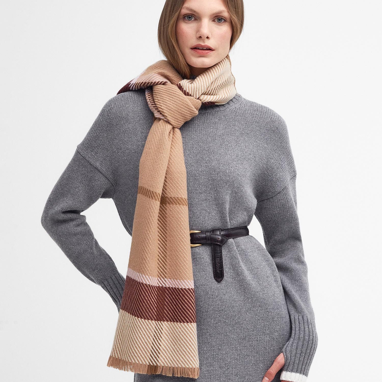 Barbour BLAIR Womens Tartan Scarf Muted Cabernet front view styled with a grey sweater, showcasing the muted cabernet color.