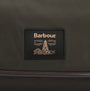 Barbour WAXED HANGING Mens Washbag Olive/Beacon logo detail view on dark green fabric.