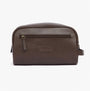 Barbour LEATHER Mens Wash Bag Dark Brown front view with zip closure and embossed logo badge.