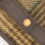 Barbour DEVERON TWEED GLOVE Mens Green Mix detail view featuring leather strap and tweed texture.