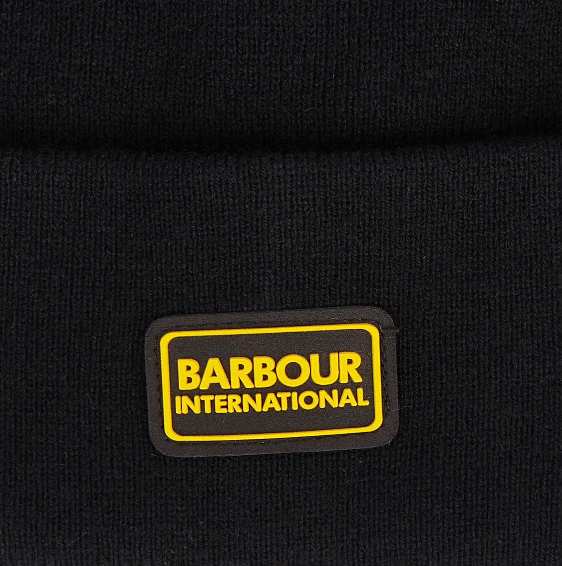 Detail view of Barbour SENSOR LEGACY Mens Beanie Black showing logo patch.