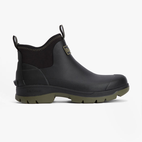 Barbour RIDGE Mens Wellies Black side view, waterproof rubber ankle boots with pull-on design and green sole.