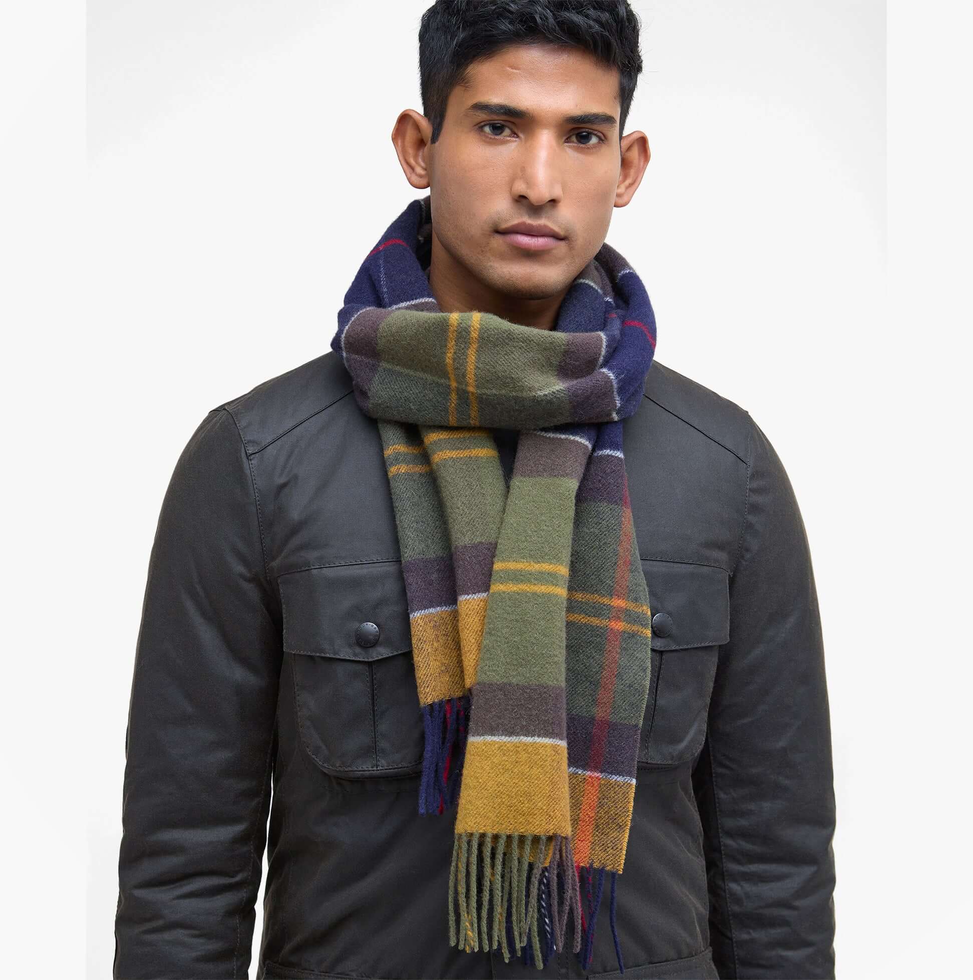 Barbour INVERNESS TARTAN Mens Winter Classic front view of a man wearing a colorful lambswool scarf.