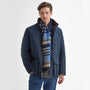 Barbour FIELD REVERSIBLE Scarf Unisex Adults Navy worn by a model in a quilted jacket, showcasing its check design.