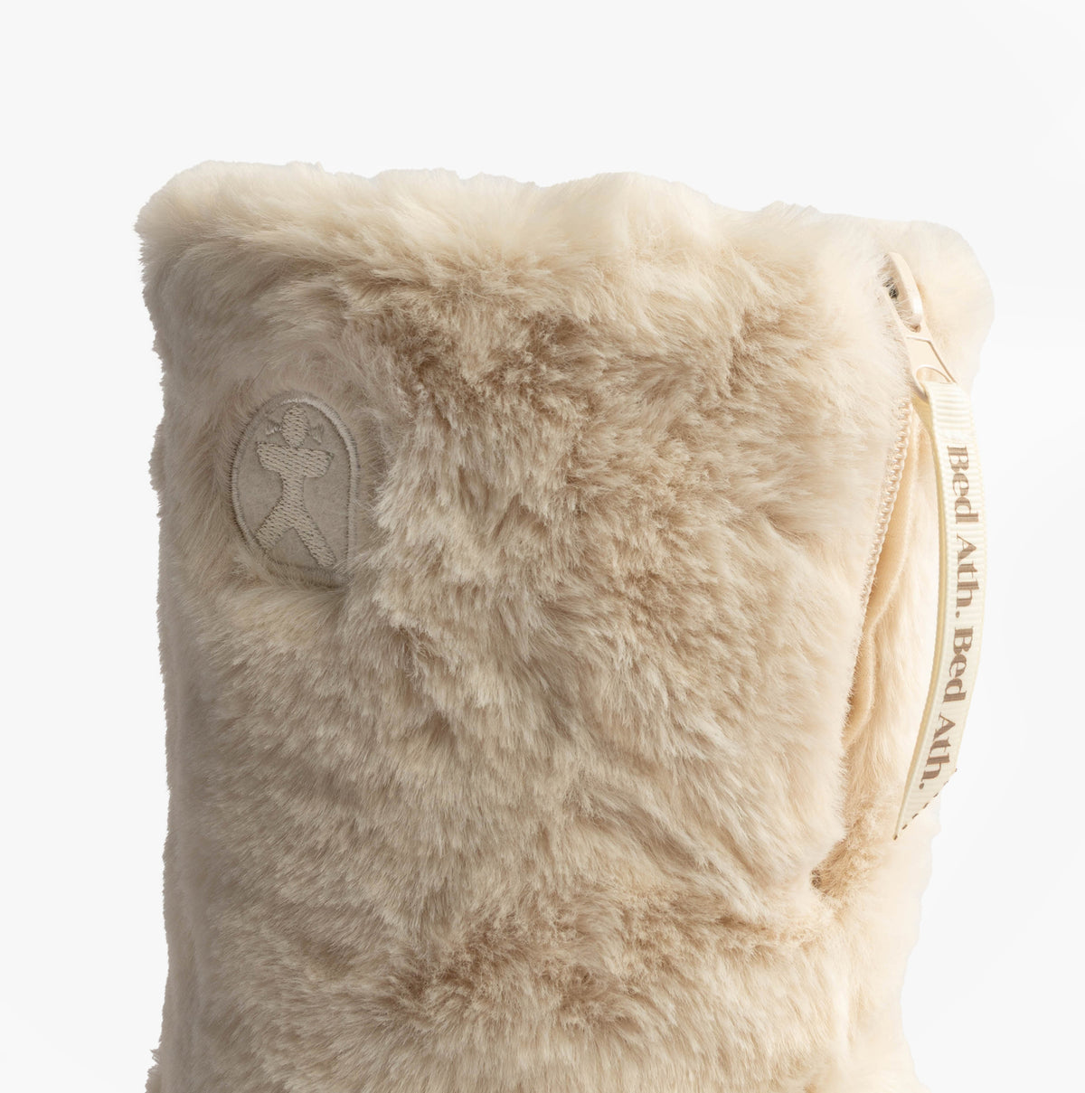 Bedroom Athletics MONROE Womens Faux Fur Boot Slippers Cream/Moonrock side view of soft faux fur material.