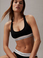 Calvin Klein MODERN COTTON Womens Bralette Black - Front view showcasing soft cups, racerback design and CK signature elastic underband.