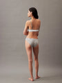 Calvin Klein MODERN LOGO Womens Bikini Briefs Grey Heather back view on model showcasing the CK signature elastic waistband.