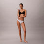 Calvin Klein BIKINI 3 PACK Womens Bikini Multicoloured front view model wearing bikini and bra, showcasing underwear fit and style.