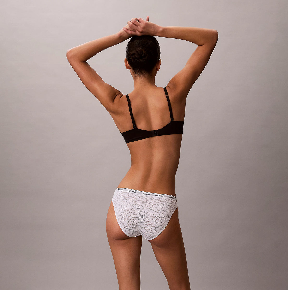 Calvin Klein BIKINI 3 PACK Womens Bikini Multicoloured, back view of model wearing bikini with light patterns.