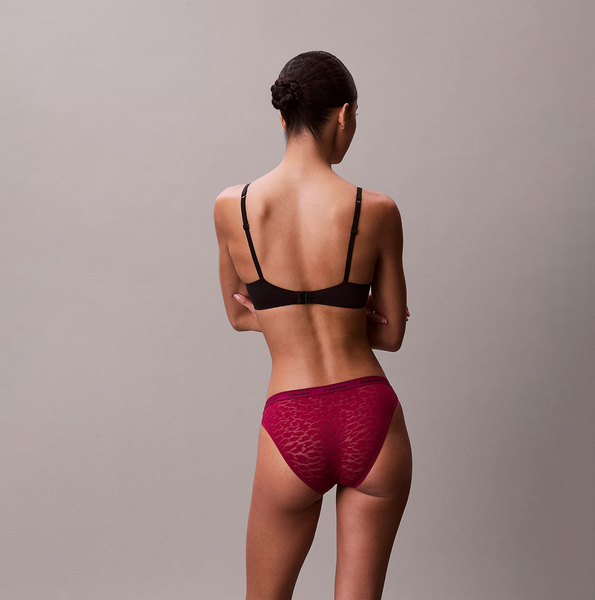 Calvin Klein BIKINI 3 PACK Womens Bikini Multicoloured, back view of model in black bra and pink bikini bottom.