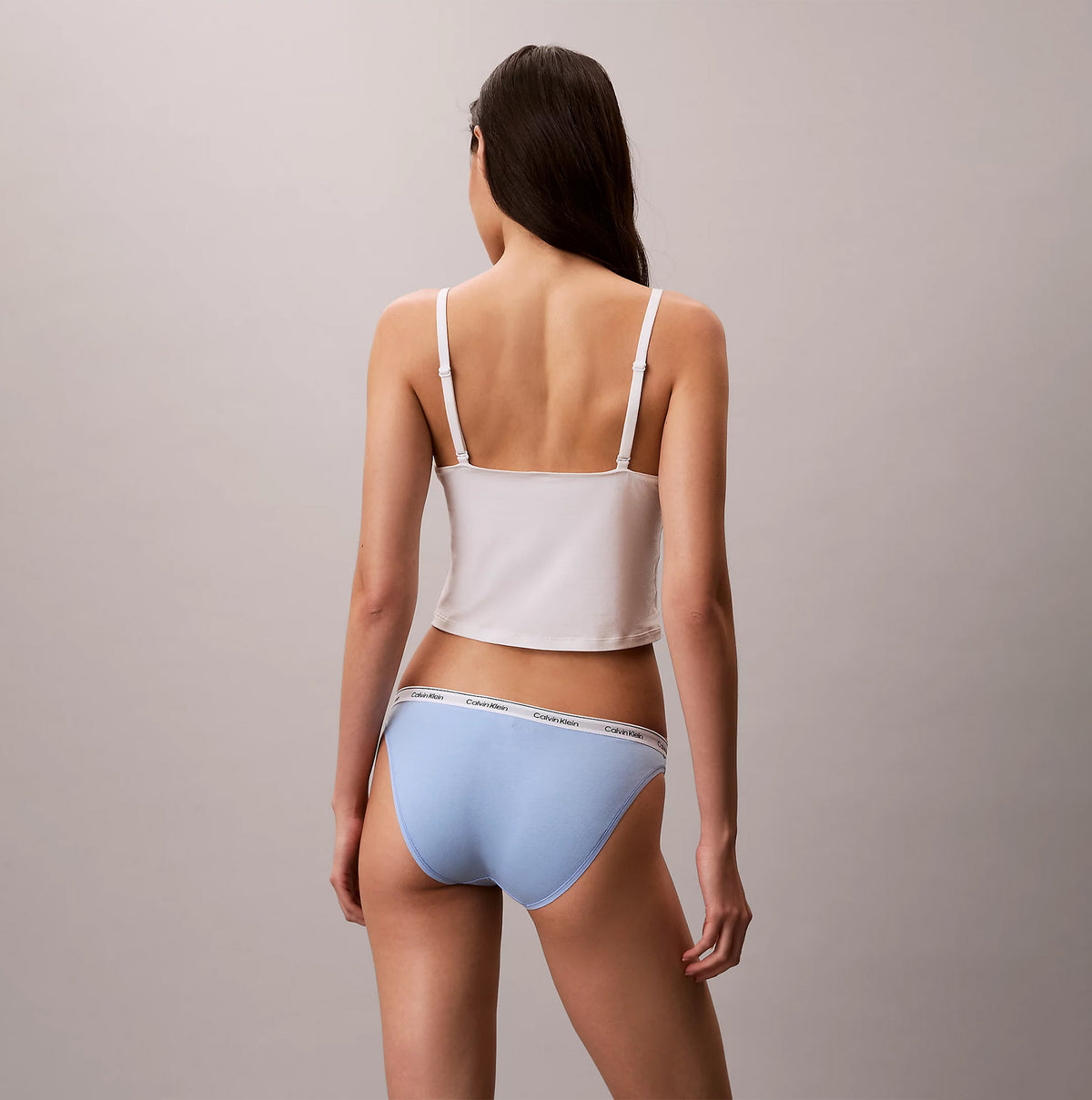Calvin Klein BIKINI 3 PACK Womens Bikini Multicoloured, back view of model wearing light blue bikini and white top.