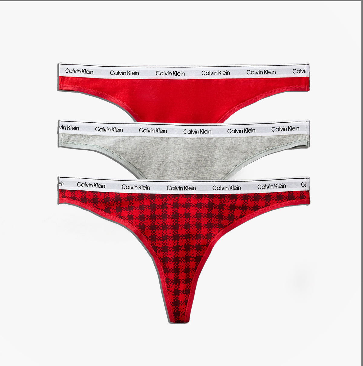Calvin Klein Icon Logo Womens 3 Pack Thong Multi - front view of three colorful thongs in red and grey with logo waistband.