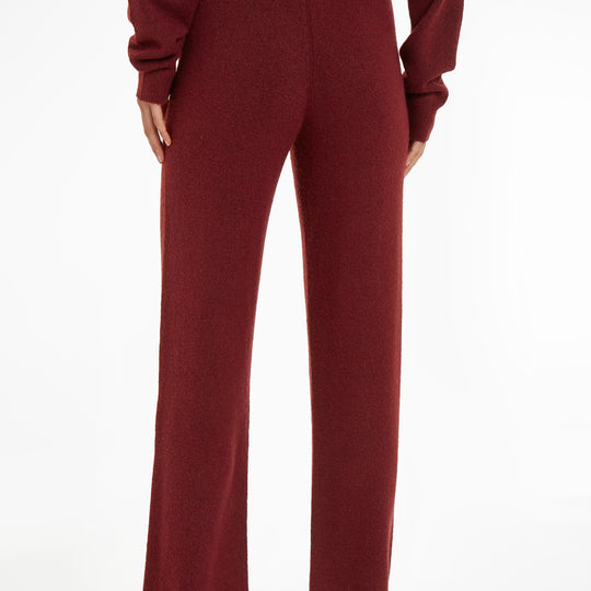 Calvin Klein Womens Pants Tawny Port Red, back view showcasing the soft fabric and regular fit of the loungewear.