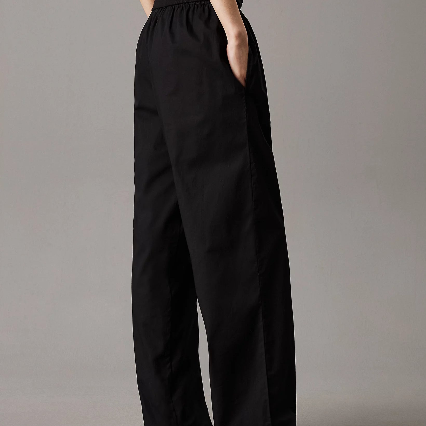 Calvin Klein CK ESTABLISHED Womens Pyjama Pants Black side view showcasing relaxed fit and pockets.