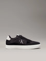 Calvin Klein CLASSIC CUPSOLE ICON Mens Trainers Black/Bright White side view showcasing black suede upper and bright white sole.