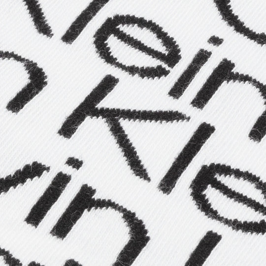 Calvin Klein 2 Pack Mens Ankle Signiture Socks White detailed view of logo pattern on fabric.