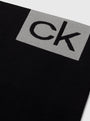 Calvin Klein LOGO Gym Leggings Black detail view of CK logo on fabric, showcasing sleek design and quality material.