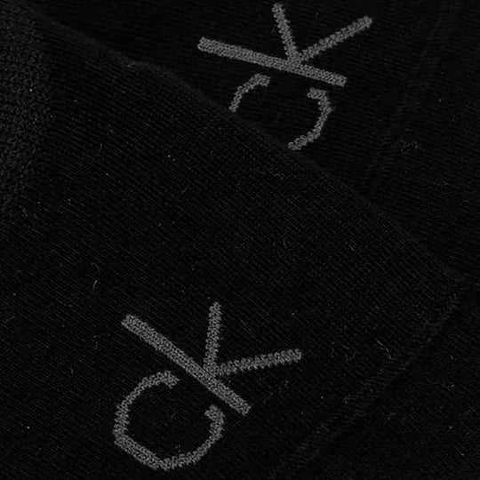 Calvin Klein 2 Pack Womens No-Show Footie Socks Black detail view showing logo on the black fabric.
