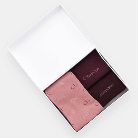 Calvin Klein 3 Pack Giftboxed Logo Womens Crew Socks Burgundy Combo in open gift box, showcasing burgundy and pink socks.