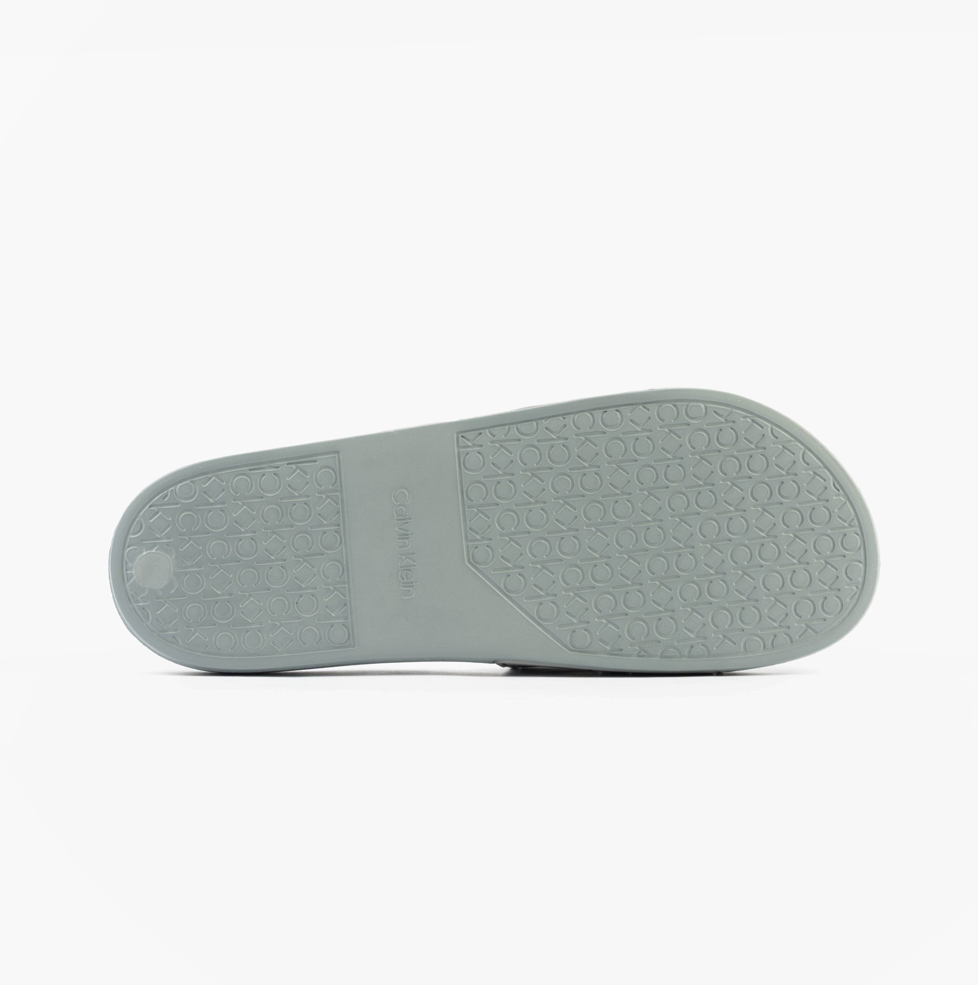 Calvin Klein POOL SLIDE DOUBLE T Mens Sliders Granite Road bottom view showcasing the rubber sole texture and design.