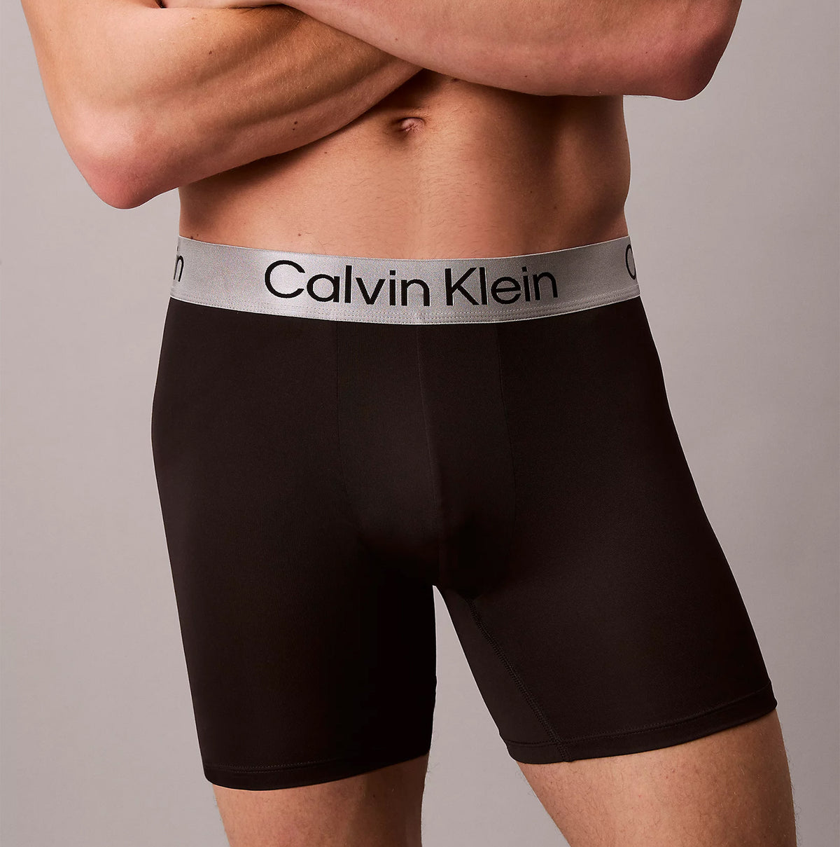 Calvin Klein LV00NB4124 BOXER BRIEF 3 PACK Mens Low Rise Trunks Multicoloured side view of black trunks with logo waistband