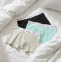 Calvin Klein COTTON BLEND Mens 3 Pack Trunks Multicoloured displayed on a bed, featuring black, mint, and patterned trunks.