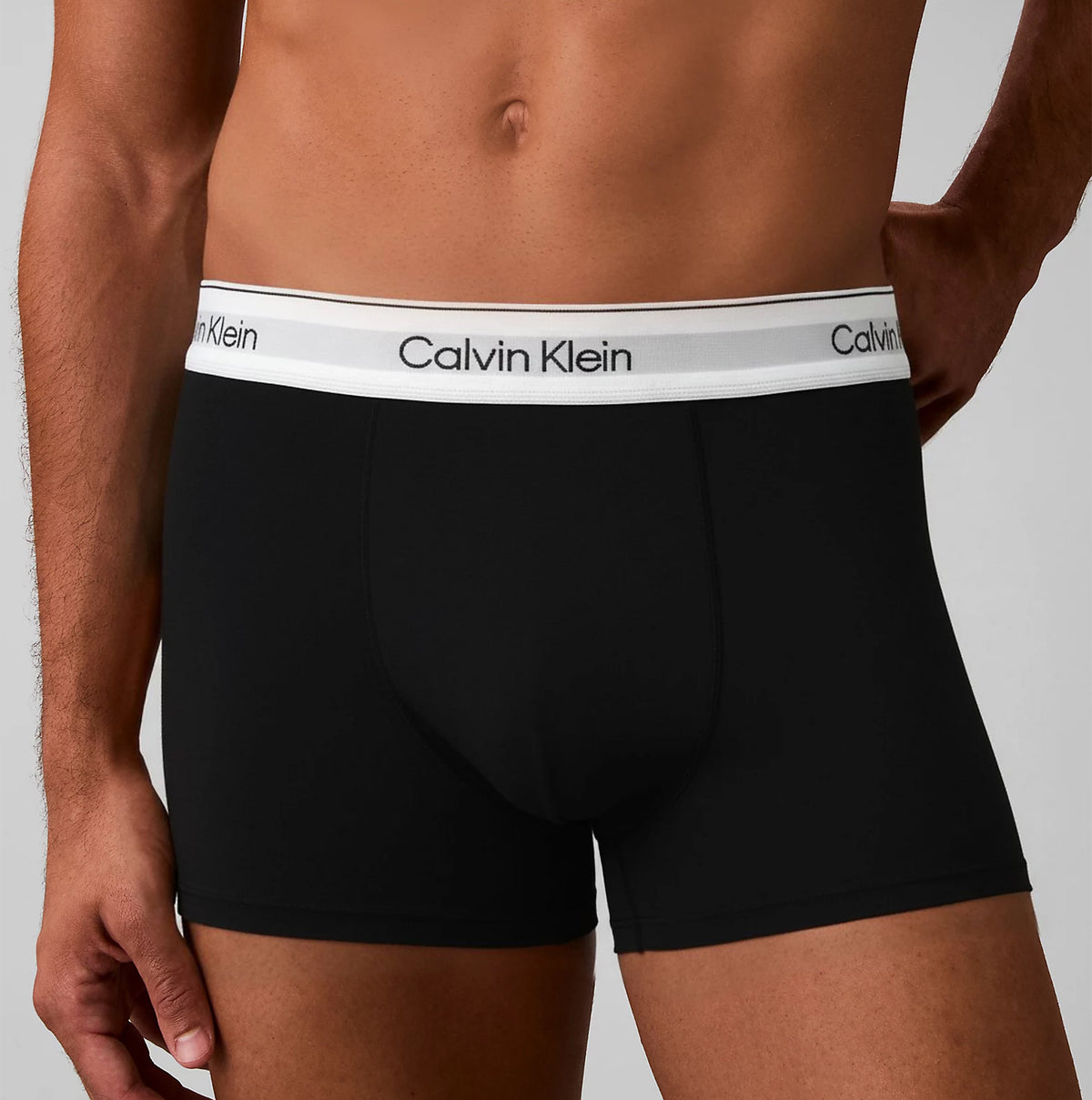 Calvin Klein COTTON BLEND Mens 3 Pack Trunks Multicoloured, front view of black trunk with logo waistband.