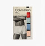Calvin Klein TRUNK 5 Pack Mens Multicoloured, front view of packaging with trunks in red, blue, and peach colors.