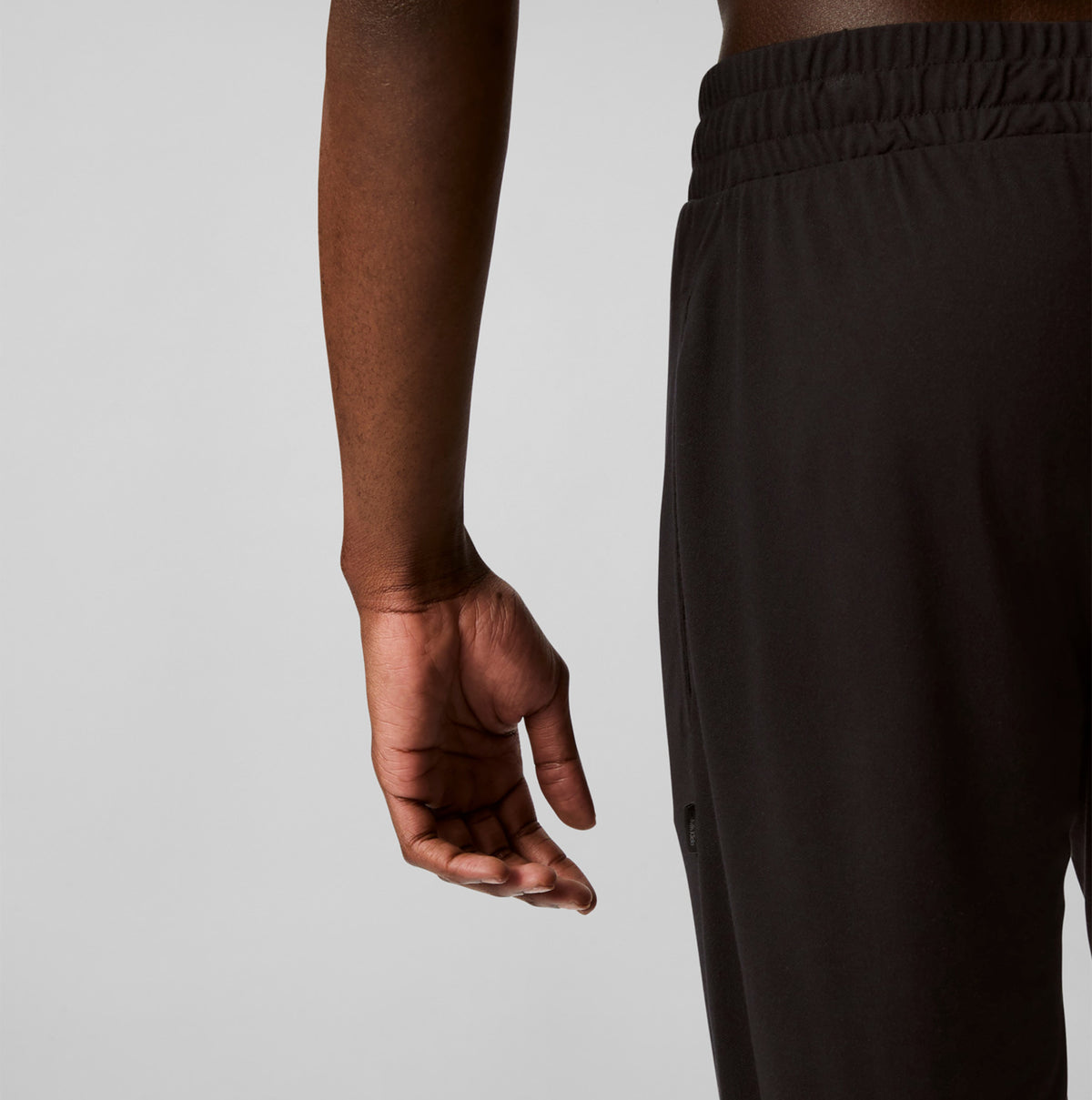 Calvin Klein ULTRA SOFT MODAL Mens Lounge Bottoms Black rear view showing cuffed tapered leg and elastic waistband.