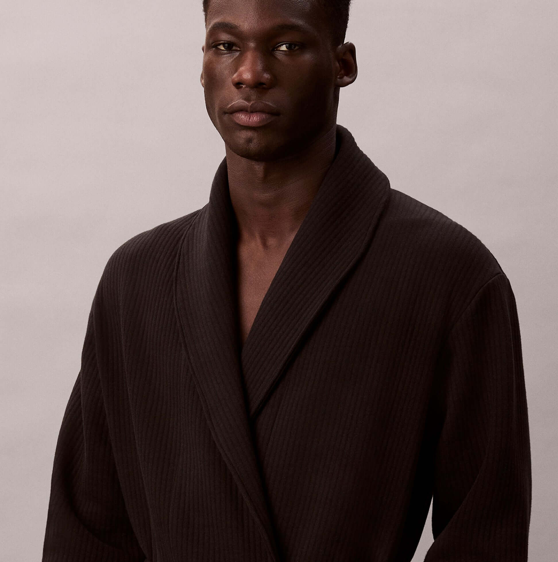 Calvin Klein QUILTED ROBE Mens Bathrobes Black front view of model wearing the robe