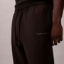Calvin Klein QUILTED JOGGER Mens Joggers Black side view showing detailed texture and logo
