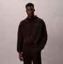 Calvin Klein QUILTED HOODIE Mens Hoodies Black front view model wearing hooded sweatshirt.