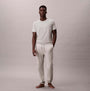 Calvin Klein JOGGER Mens Grey Heather front view model wearing joggers and t-shirt on neutral background.