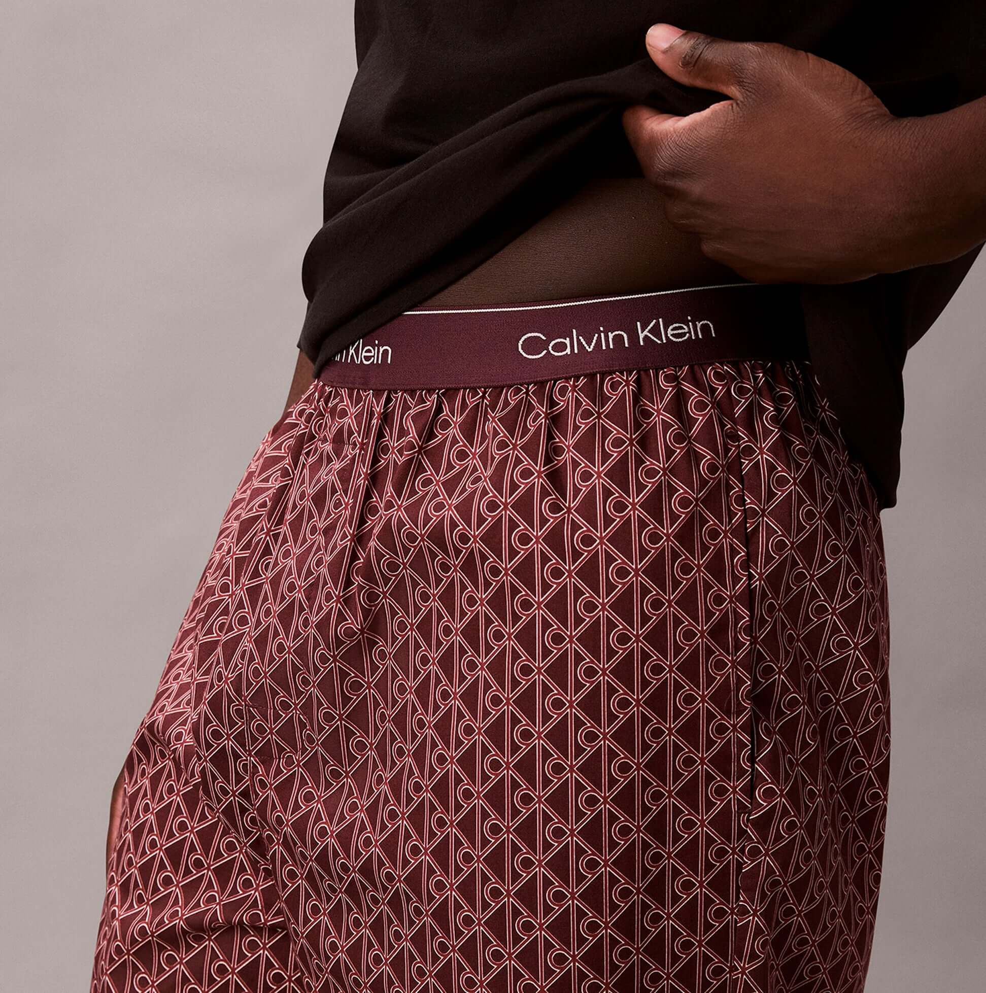 Calvin Klein LS TEE PANT SET Mens Multicoloured side view showcasing patterned pants and branded waistband