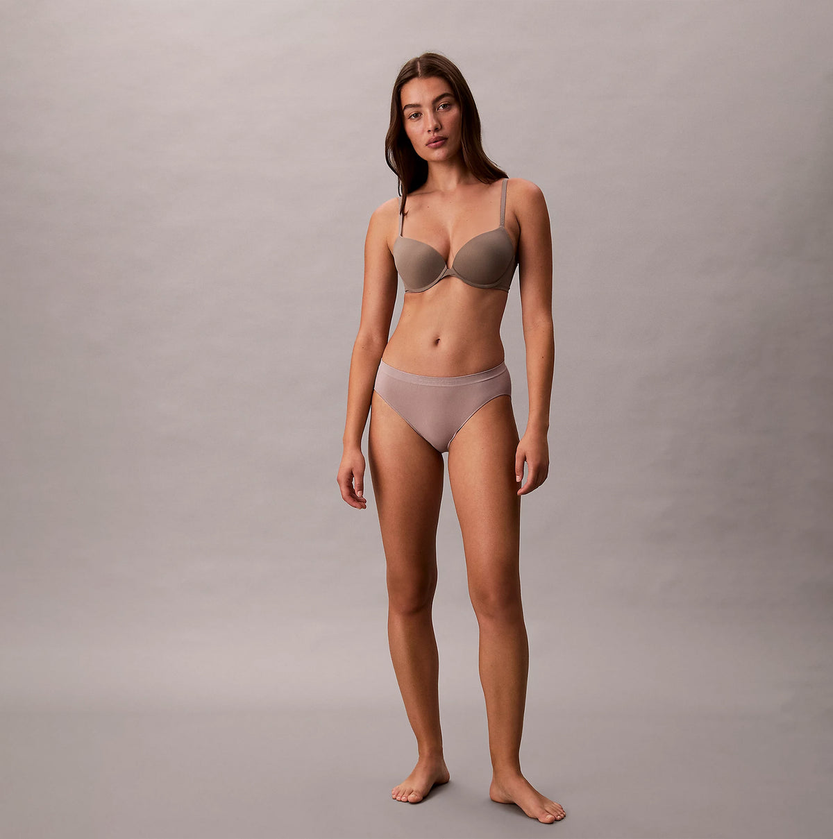 Calvin Klein BIKINI 3 PACK Womens Bikini Multicoloured front view of model wearing beige bikini and bra.