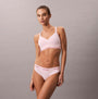 Calvin Klein Icon Cotton Modal Womens Thong Pink side view model wearing pink thong and bralette