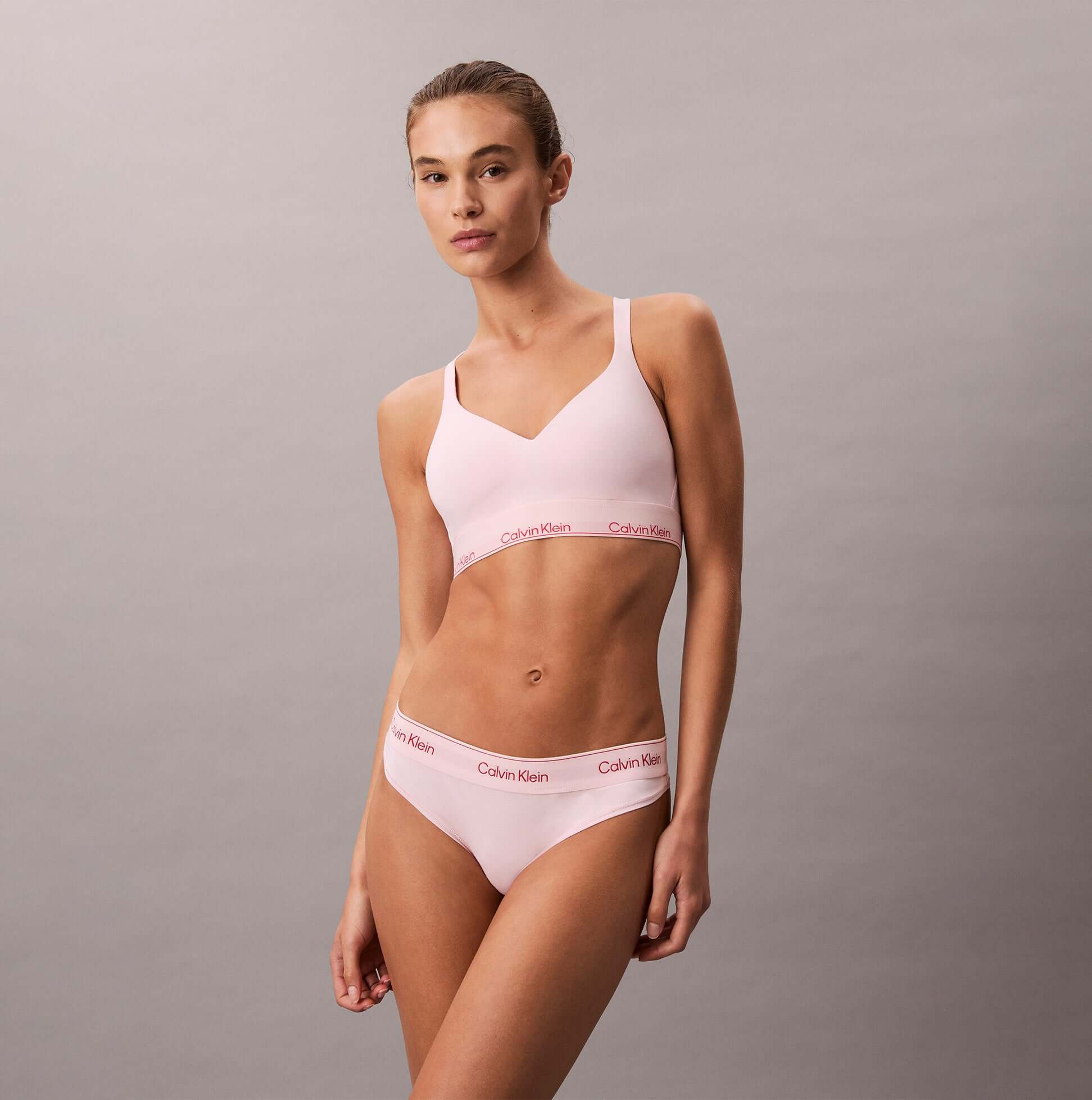 Calvin Klein Icon Cotton Modal Womens Thong Pink side view model wearing pink thong and bralette