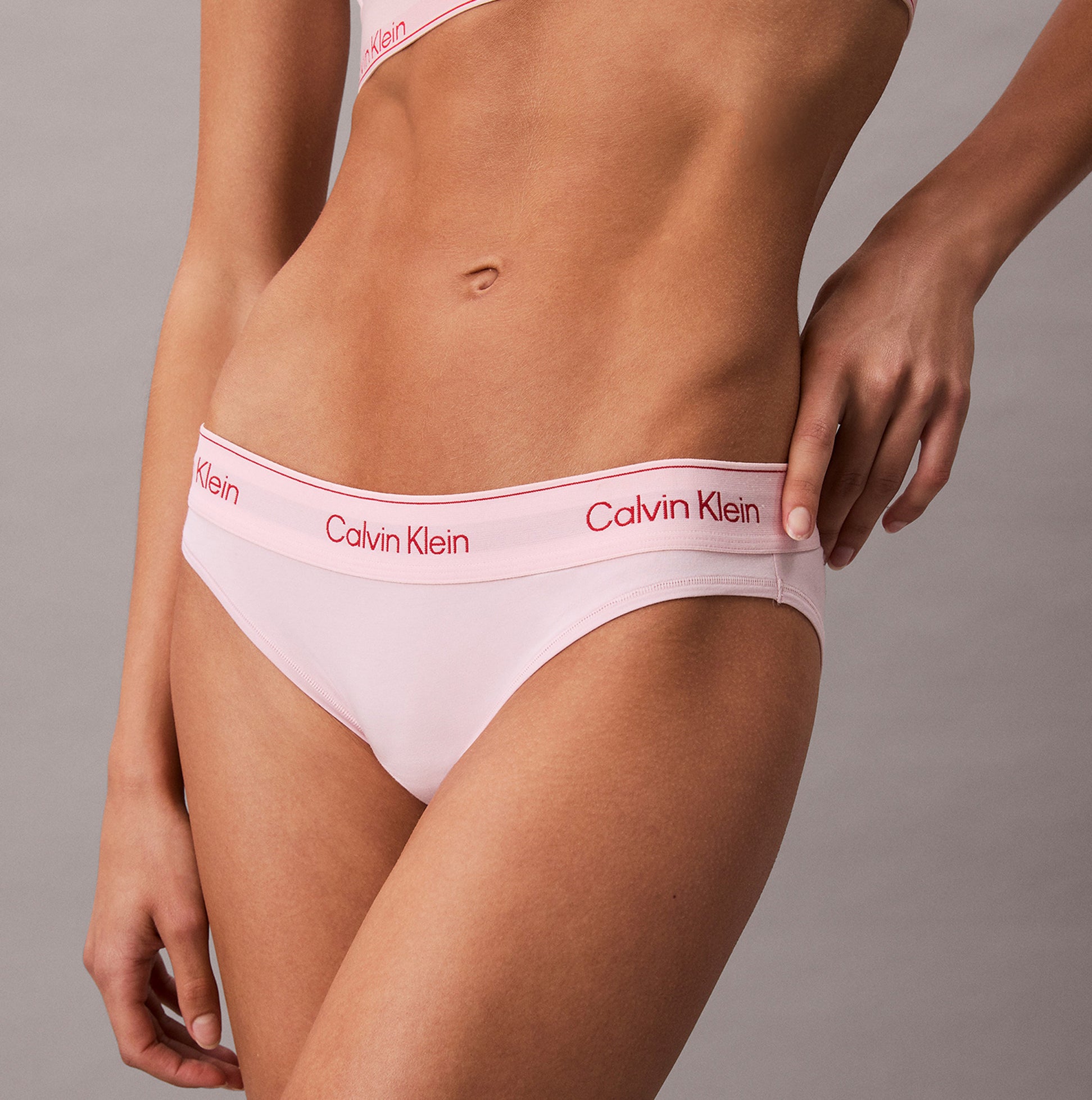 Calvin Klein Icon Cotton Modal Womens Bikini Brief Pink side view featuring soft cotton modal fabric and signature waistband.