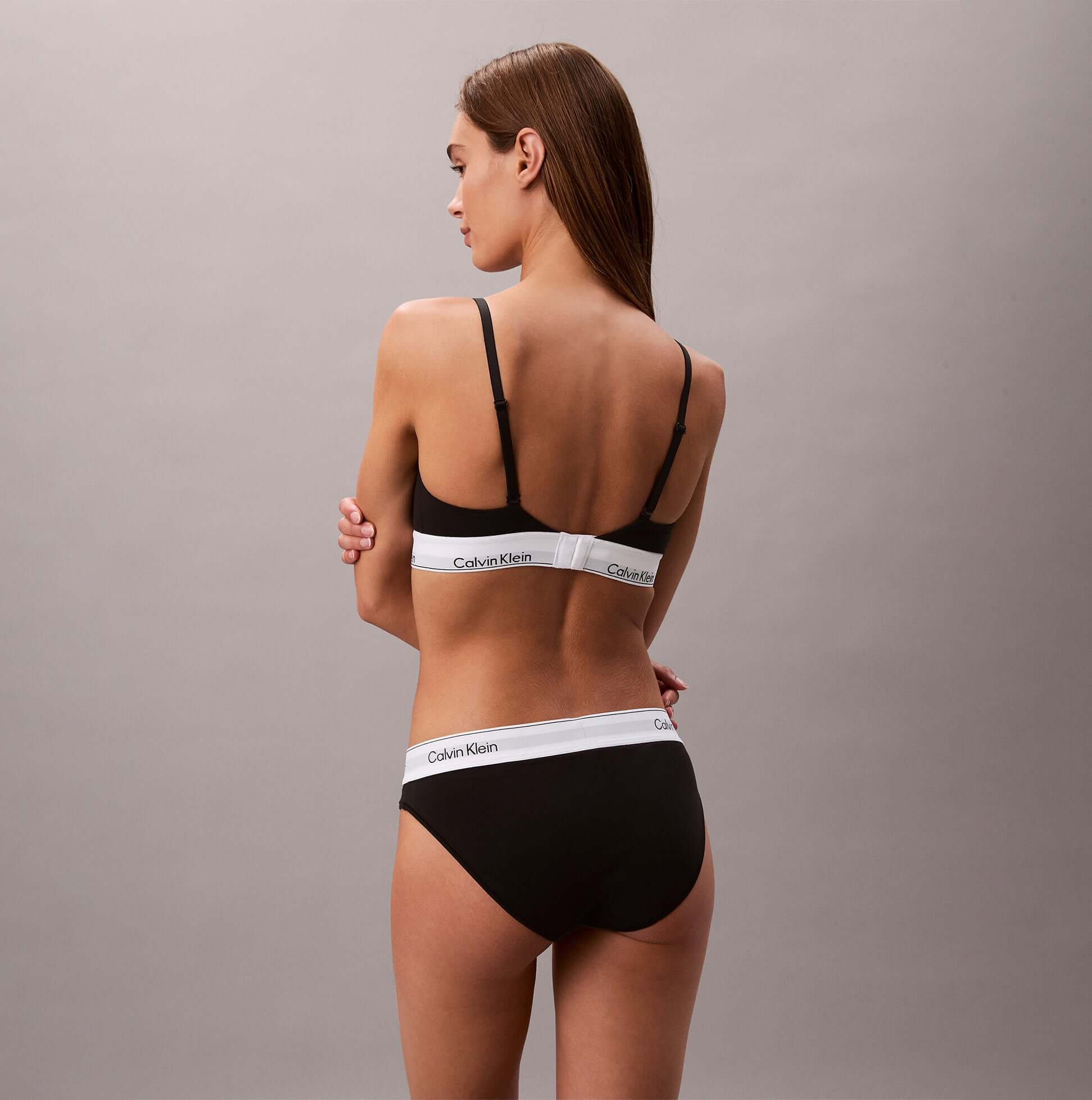 Calvin Klein Icon Cotton Modal Womens Bikini Briefs Black rear view showcasing soft fabric and stylish design.