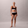 Calvin Klein Icon Cotton Modal Womens Boy Shorts Black, front view, model wearing matching set with white logo elastic band.