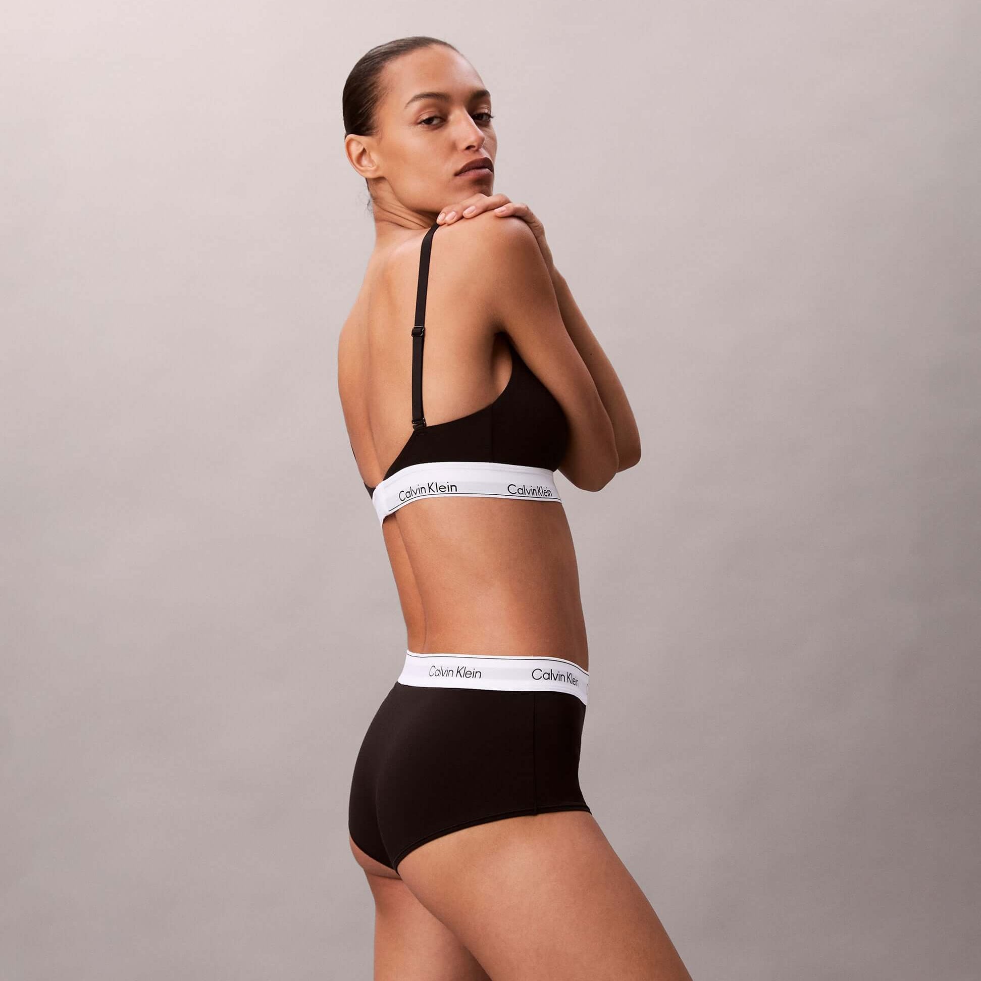 Calvin Klein Icon Cotton Modal Womens Boy Shorts Black side view worn with matching bra.