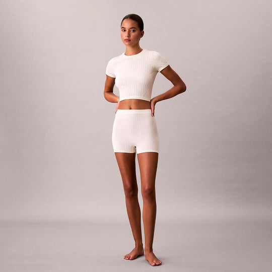 Calvin Klein SEAMLESS SHORTIE Womens Shorts Ivory front view model wearing matching top and shorts.