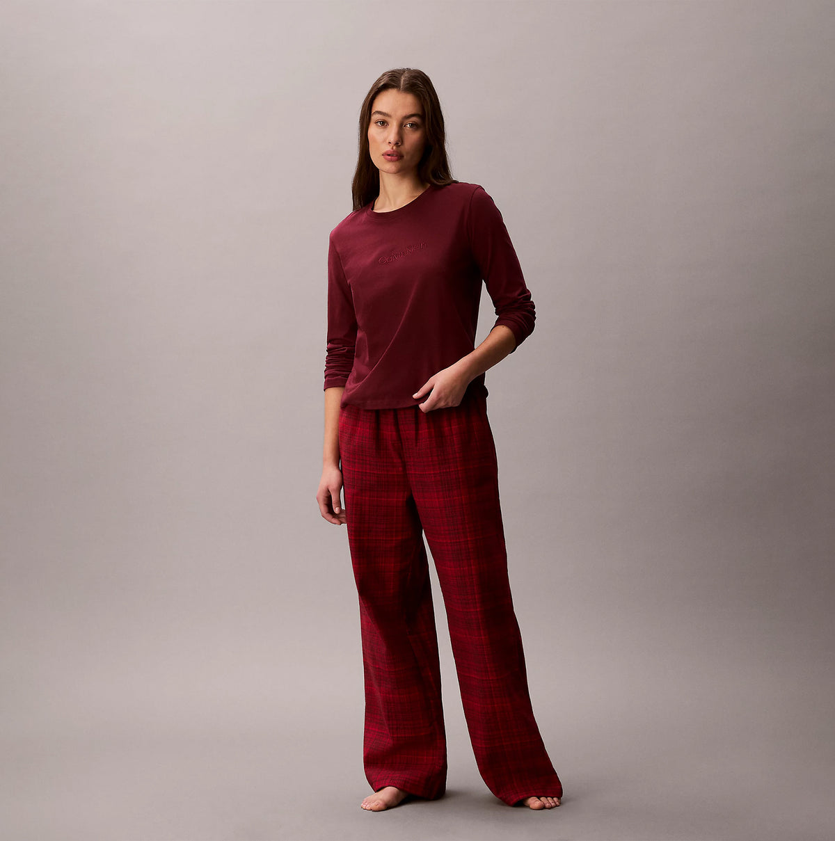 Calvin Klein LS TEE FLANNEL PANT Womens Pant Set Red, front view of model wearing red long sleeve tee and plaid pants.