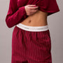 Calvin Klein LS TEE FLANNEL PANT Womens Pant Set Red detail view showcasing waistband and fabric texture.