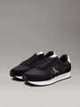 Calvin Klein RETRO RUNNER ICONIC Mens Trainers Black/Bright White side view showcasing suede and mesh materials.