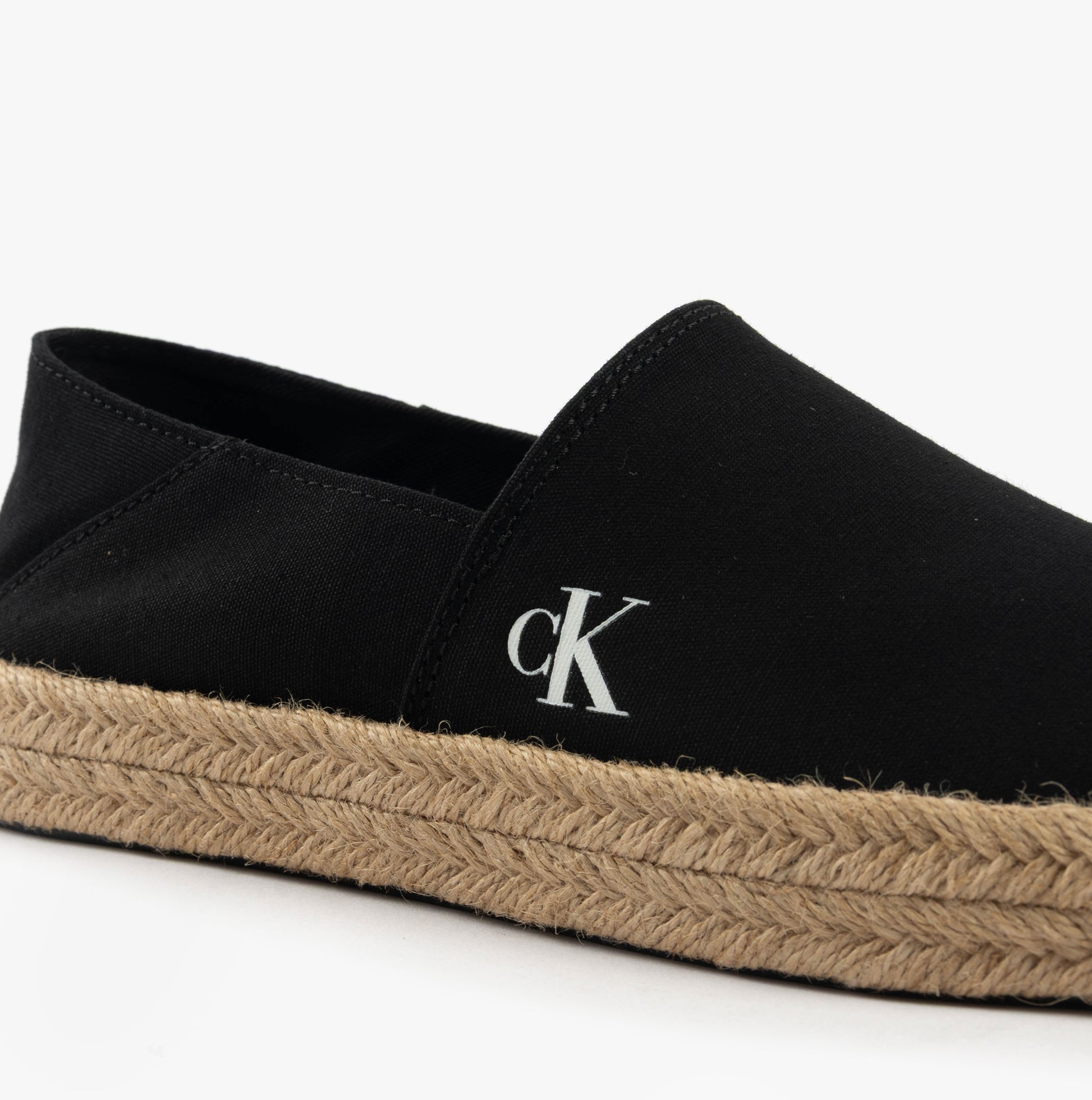 Calvin Klein ESPADRILLE Mens Canvas Shoes Ck Black side view showcasing a slip-on design and rope sole detail.